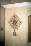 Painted design on bathroom wall