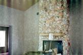 Faux stone walls match natural stone